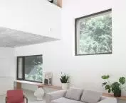 Inverted ridge made it possible to make a higher living room