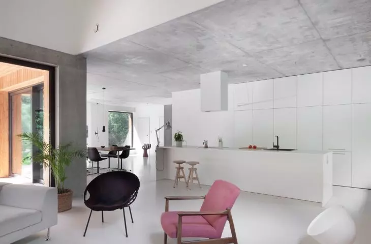 White kitchen blends with the interior