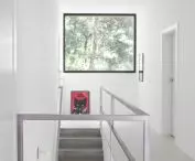Stairs lead to the first floor where there are bedrooms
