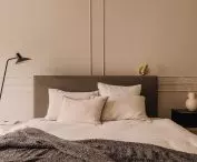 Bedroom kept in subdued colors and natural materials