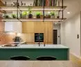 Kitchen with copper scales on the wall