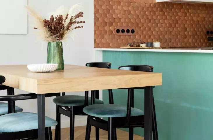 Dining room, copper wall in the background