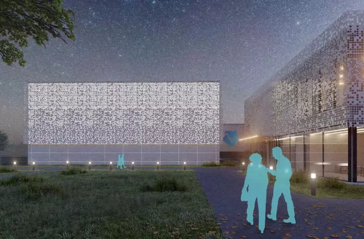 The openwork facade is illuminated with LED lights