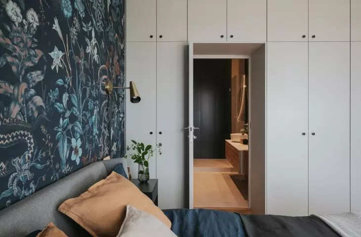Hidden in the closet is the door to the bathroom