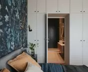 Hidden in the closet is the door to the bathroom