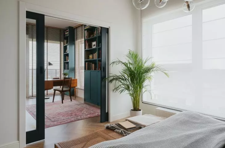 Behind the sliding door is the study