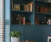 Blue cabinet for books and memorabilia