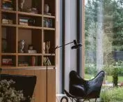 Fragment of the living room and with a wooden bookcase