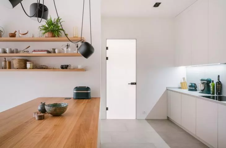 The white part of the kitchen