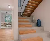 Interior of the house in boho style, monumental staircase