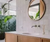 Also in the bathroom there are round mirrors