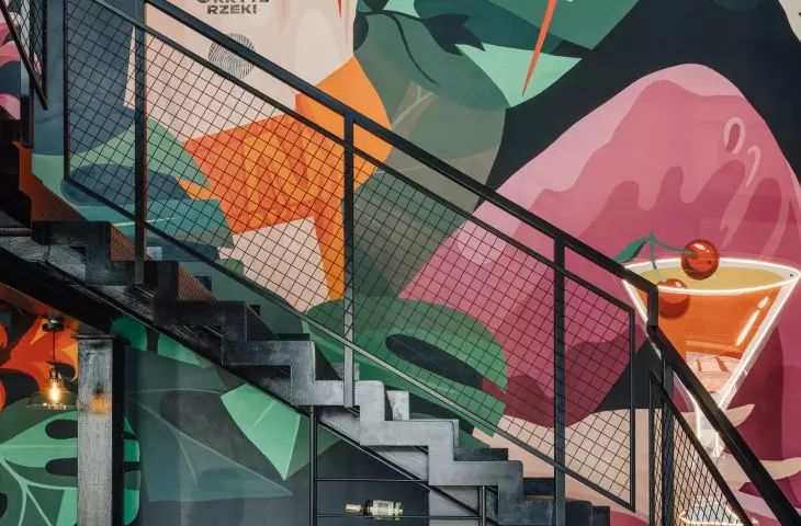 The staircase leading to the mezzanine next to which a mural was chosen