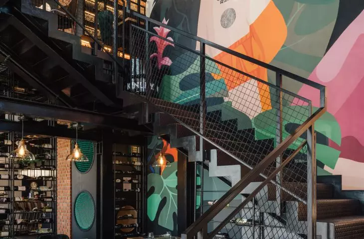 The staircase leading to the mezzanine next to which a mural was chosen