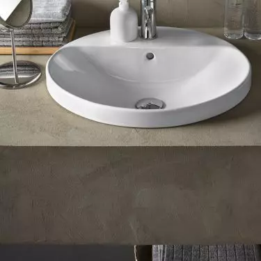 Rounded washbasin will add lightness to the styling