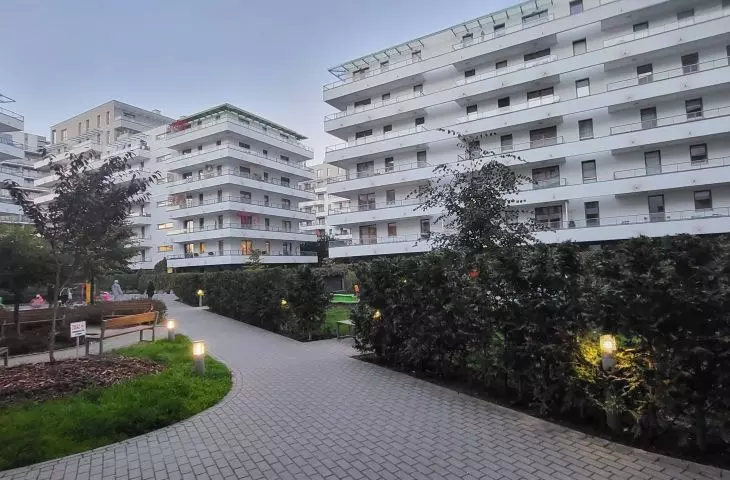Bliska Wola estate - inner courtyard with green areas, small architecture and walking paths