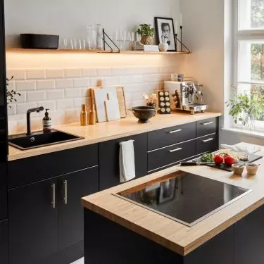 Kitchen with black built-ins