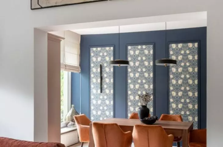 The dining room is located next to the living room