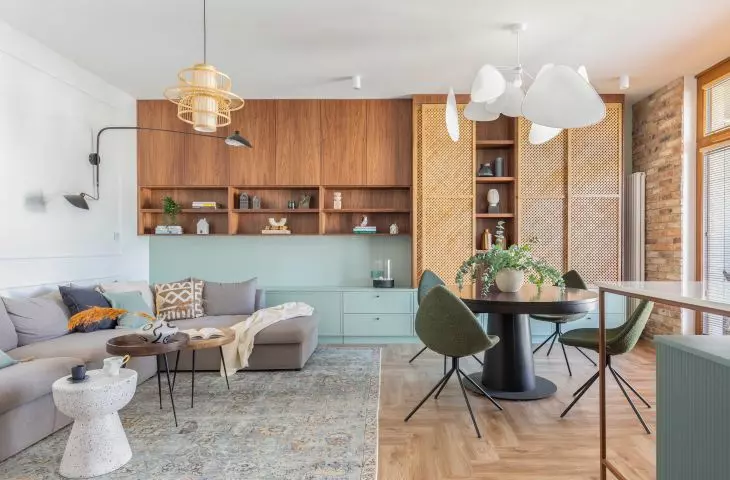 Common space connects dining rooms, living room and kitchens