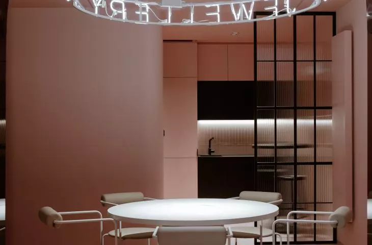 Office area, kitchen in the background