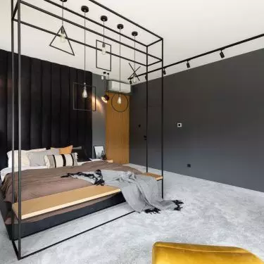 The bed is finished with a seat