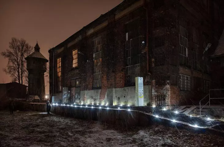 Illuminated route leading to Paweł Błęcki's installation