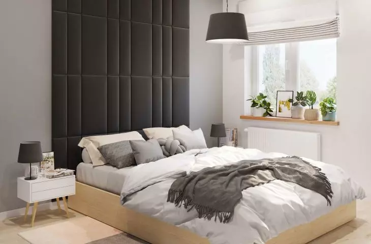 Upholstered panels are a great idea for a striking wall behind the bed