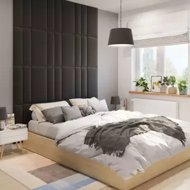Upholstered panels are a great idea for a striking wall behind the bed