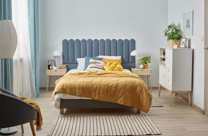 A cold wall? You can forget about it by using upholstered panels as a headrest
